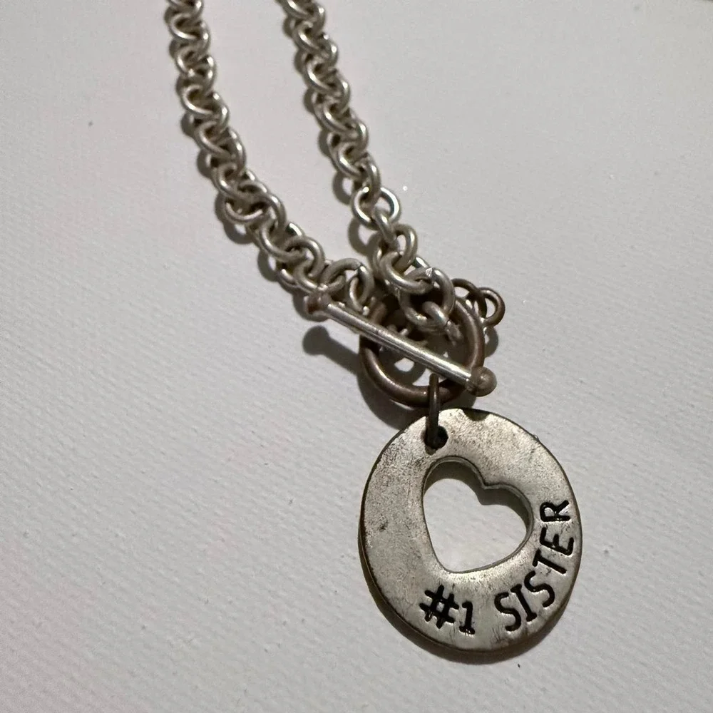 Vintage #1 sister chain bracelet with barbell closure. Printed on both sides